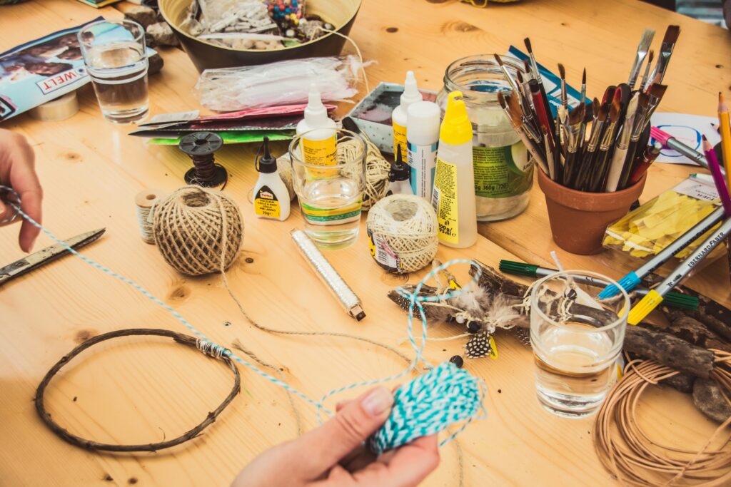 Tabletop covered in craft materials