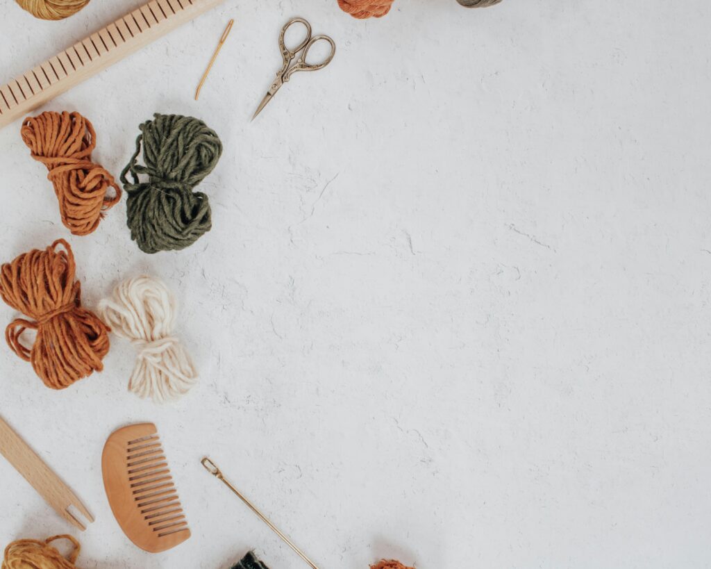 Crafting supplies such as yarn, scissors, etc.
