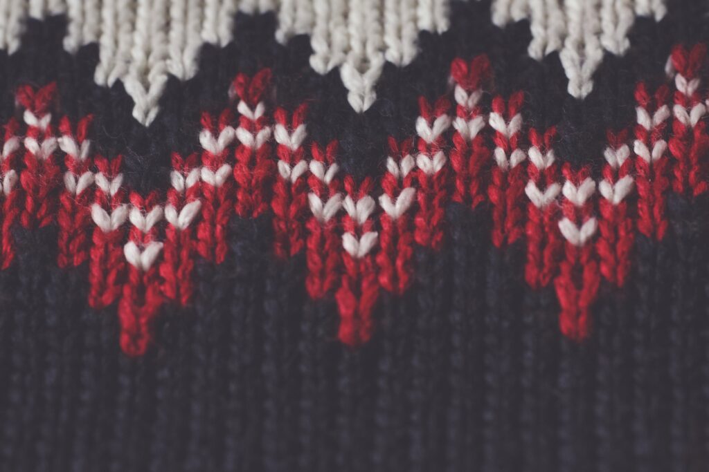 Closeup shot of a knitting pattern in different colors