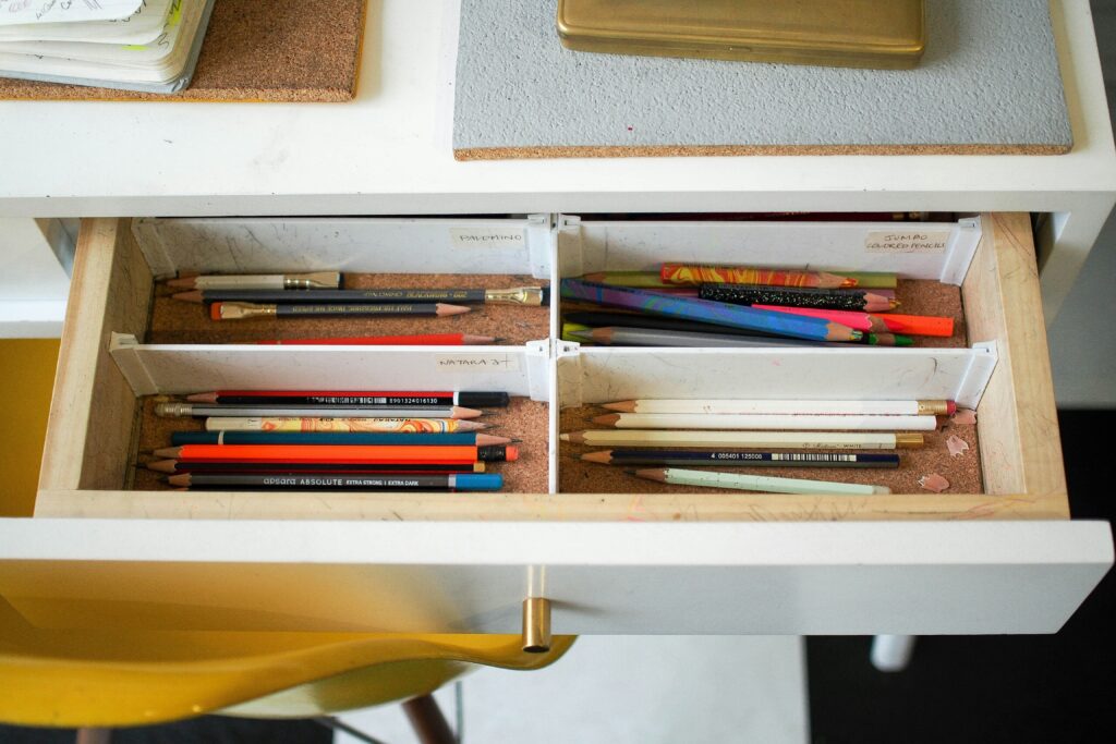 Pencils in an organised drawer, sorted for their purpose and hardness